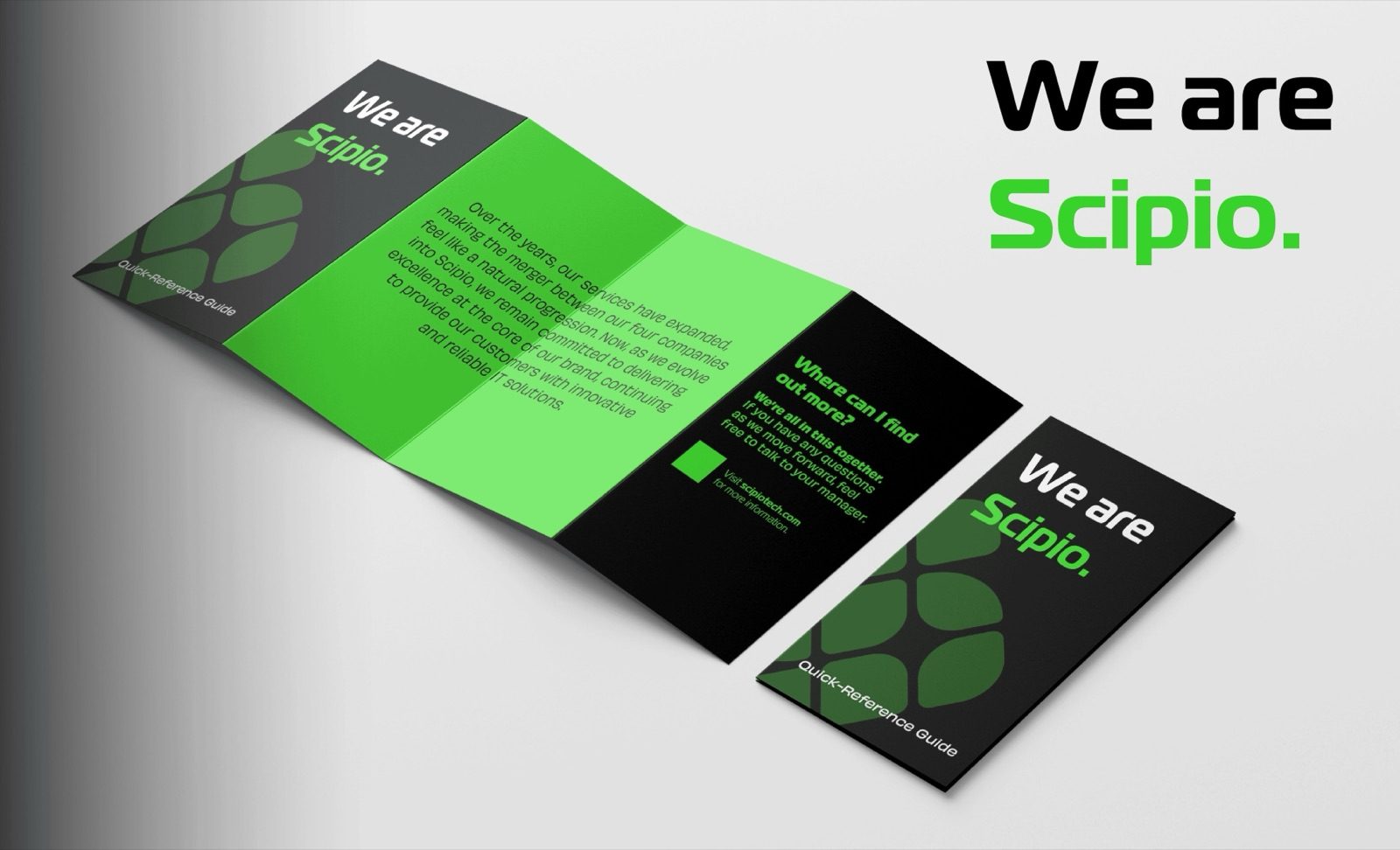 A folded 'We are Scipio' brochure in green and black, shown open and closed
